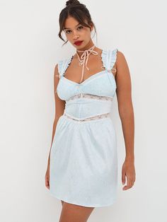 With French-inspired vintage aesthetics, this flirty babydoll-style dress boasts ruffled shoulders, pintucks, and scalloped lace detailing fit for a queen (aka, you). Pair it with the Ellery Thong Panty to complete the look.FOR LOVE & LEMONS FOR VICTORIA’S SECRET: An exclusive collaboration that blends dreamy confidence with thoughtful detailing, giving each piece a unique and feminine feel. Unlined Wireless Pintucks throughout Lace detailing front and back Princess seams Tie details front and back Rosette appliques front and back Full gathered skirt Back zip closure Mini-length Partially made from recycled materials Machine wash cold Imported Babydoll Style Dress, Blue Slip Dress, Lingerie Catalog, Babydoll Style, Decorative Bows, Dress Order, Dreamy Dress, Lingerie Dress, For Love & Lemons