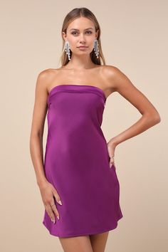 Get ready to arrive on the scene and cause a commotion in the Lulus Exquisite Approach Purple Satin Strapless Cowl Back Mini Dress! Sleek satin shapes this flirty dress that features a straight, foldover neckline (with hidden no-slip strips) and a strapless, darted bodice. The flattering slip-style silhouette falls to a sexy mini hem, while an elasticized strap sits above a trendy cowl back. Hidden zipper/clasp at side. Fit: This garment fits true to size. Length: Mid-thigh. Size medium measures Mini Dress Satin, Purple Satin Dress, Cowl Back Dress, Short Graduation Dresses, Casual Formal Dresses, Purple Mini Dresses, Flirty Dresses, Casual Wedding Dress, Adhesive Bra