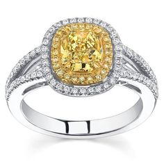 a yellow and white diamond ring