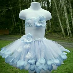 Very Cute Turquoise Toddler Tutu Dress It Has Turquoise Tulle Under White Tulle With Matching Top Embellished With Silk And Lace Rose Petals, Turquoise Pearls And A Rhinestone Brooch, This Would Fit A Toddler Size 12m-3t Blue Ruffled Tutu Dress For Spring, Light Blue Spring Tutu Dress For Dress-up, Fitted Blue Tutu Dress For Dress-up, Light Blue Tutu Dress For Spring Dress-up, Fitted Blue Tutu Dress For Summer, Summer Blue Fitted Tutu Dress, Cute Blue Party Skirt, Cute Fitted Blue Skirt, Whimsical Blue Fitted Tutu Dress