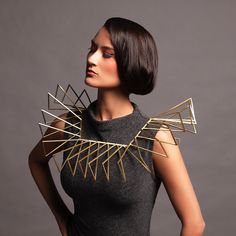 The forms in this series of sculptural adornment are strongly influenced by Elizabethan Collars. The designs which create these neckpieces are inspired by art the artist finds beautiful and dramatic; including Japanese Basket Weaving, Architecture, and Geometry. This piece is hand constructed from brass wire. Body Adornment Jewellery, Elizabethan Collar, Avant Garde Jewelry, Sculptural Fashion, Body Adornment, Art Jewelry Contemporary, Neck Piece, Floral Jewellery, Contemporary Jewellery