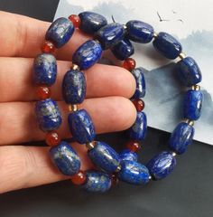 "Barrel Natural Blue lapis lazuli,gemstone stone beaded, good luck bracelet material: natural lapis lazuli stone Size: 1# lapis barrel: 10mmx15mm, yellow glass crystal ,8\" 2# lapis barrel: 10mmx14mm,red agate:6mm,8\" style: Elastic thread, if need other length, please contact me, i will make for you. ❤ If you want other length Bracelet, Please connect me free. this may match the necklace ,earring, ❤Please read the store policy before purchase. ❤ Thank you for visiting my shop!" Sapphire Lapis Lazuli Bracelets As Gift, Bohemian Lapis Lazuli Beaded Bracelets As Gift, Sapphire Gemstone Beads Bracelet In Lapis Lazuli, Lapis Lazuli Beaded Bracelet Gift, Lapis Lazuli Gemstone Beads Bracelets As Gift, Sapphire Lapis Lazuli Beaded Bracelets, Lapis Lazuli Gemstone Beaded Bracelet For Gifts, Sapphire Lapis Lazuli Gemstone Beaded Bracelets, Lapis Lazuli Gemstone Beads Bracelet For Gift