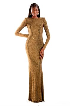 Own the night in the Valentina, a long-sleeve maxi gown that redefines glamour. This bronze masterpiece, crafted from shimmering crystalized rhinestone acetate, cascades elegantly to the floor. The semi-open back, secured by a discreet button closure, adds a touch of intrigue, while the range of sizes ensures a perfect fit for every fashion-forward form. This is more than a dress, it's an unforgettable entrance. Luxury Long Sleeve Maxi Wedding Dress, Luxury Long Sleeve Maxi Dress For Wedding, Luxury Long Sleeve Wedding Maxi Dress, Long Sleeve Sequin Maxi Dress For Evening, Luxury Long Sleeve Gala Gown, Luxury Long Sleeve Gown For Gala, Formal Maxi Evening Dress With Rhinestones, Formal Evening Dress With Rhinestones In Maxi Length, Luxury Embellished Long Sleeve Maxi Dress