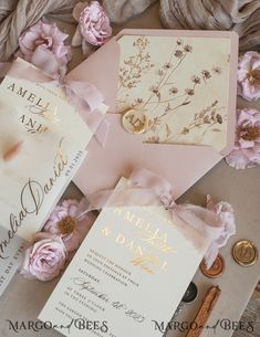 Are you dreaming of a whimsical and elegant garden wedding? Look no further than our stunning blush gold wedding invitation featuring delicate dierd flowers and pampass grass. The invitation is beautifully presented in a vellum etui, adding an extra touch of luxury to your special day. For those looking for a more traditional yet elegant option, our garden floral wedding invitation with a mirror gold heart is the perfect choice. The intricate floral design exudes sophistication and romance, maki