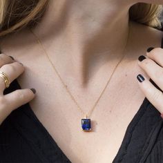 An Elegant and simply stunning gold Sapphire necklace.This handmade piece of jewelry is set with a 10x12 Sapphire corrndum (6.51ct minimum) in  the deepest and most beautiful blue.The setting itself is vintage inspired in its simplicity and holds the stone securely whilst allowing for maximum light to enter the stone.Hangs from a strong yet dainty vintage inspired oval link chain.Making & Shipping of this piece:Each item is made to order, please allow 4-7 days in normal times and 5-11 days d Sapphire Pendant Birthstone Necklace, Sapphire Necklace Fine Jewelry Gift, Sapphire Birthstone Pendant Necklace, Fine Jewelry Sapphire Necklaces As Gift, Sapphire Pendant Birthstone Necklace For Gift, Sapphire Pendant Necklace With Birthstone, Elegant Blue Emerald Gemstone Necklace, Yellow Gold Sapphire Birthstone Necklaces, Dainty Sapphire Necklace For Formal Occasions