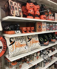 halloween decorations on shelves in a store