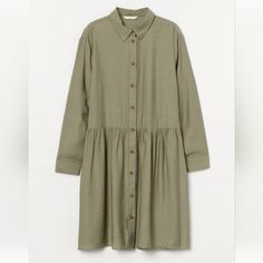 H&M Size Large Khaki Green Knee Length Button Down Shirt Dress Item Is New Without Tags Short Dress In Woven Fabric With A Collar, Gathered Yoke At The Back And Buttons Down The Front. Gently Dropped Shoulders, Long Sleeves With Buttoned Cuffs, A Gathered Seam At The Waist And A Flared Skirt. Unlined. H And M Shirt Dress, Khaki Collared Dress For Daywear, H&m Casual Dresses For Daywear, Casual H&m Dresses For Daywear, Casual H&m Daywear Dresses, Green Buttoned Shirt Dress For Daywear, Green Shirt Dress With Buttons For Daywear, Khaki Button-up Dress For Daywear, Khaki Buttoned Dress For Daywear