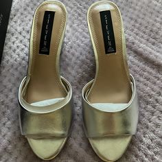 Never Worn, Beautiful Steven By Steve Madden Slip-On Sandals In Metallic Silver. 2.25” Covered Heel. Faux Leather. Party Slip-on Mules With Heel Loop, Synthetic Closed Toe Mules With 4-inch Heel, Synthetic Slip-on Mules With Heel Loop, High Heel Synthetic Mules With Cushioned Footbed, Synthetic Slip-on Heels With Stacked Heel, Open Toe Mules With 4-inch Heel, Open Toe Synthetic Mules With 4-inch Heel, Silver Mules With Padded Heel And Round Toe, Synthetic Open Toe Mules With 4-inch Heel