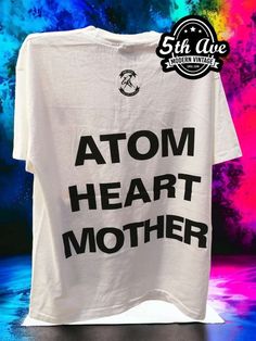 a white t - shirt with the words atm heart mother printed on it