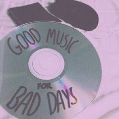 a cd with the words good music for bad days written on it