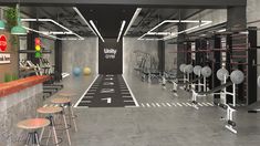 an empty gym with stools and tables