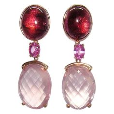 Earrings Pink Gold 18 K Gianni Lazzaro Diamonds brown 4-0,08 ct GSI Rosa Sapphire 2-0,86ct Rosa Quartz 2-18,75 Tourmaline Cabochon 2-9,26ct Weight 12,30 gram With a heritage of ancient fine Swiss jewelry traditions, NATKINA is a Geneva based jewellery brand, which creates modern jewellery masterpieces suitable for every day life. It is our honour to create fine jewelry, and it’s for that reason that we choose to only work with high-quality, enduring materials that can almost immediately turn int Elegant Rose Gold Multi-stone Earrings, Luxury Rose Gold Earrings With Gemstone Accents, Luxury Pink Multi-stone Earrings, Formal Briolette Earrings With Gemstone Accents, Pink Multi-stone Earrings In Fine Jewelry Style, Pink Multi-stone Earrings Fine Jewelry, Formal Pink Gold Gemstone Earrings, Formal Rose Gold Earrings With Gemstone Accents, Elegant Pink Gemstones With Accents