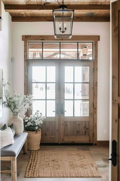 the entryway is clean and ready to be used as a place for flowers or plants