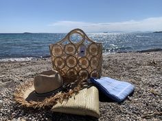 Hippie Fish straw beach tote handmade from beautiful macrame circles placed together to form a cute beach bag that is sure to be admired. As seen in the Greek islands, NY, Caribbean and Florida this straw bag is a popular summer accessory by fashion lovers and bloggers all over the world. Macrame Circle, Straw Beach Tote, French Market Basket, Straw Crafts, Grocery Basket, Crochet Macrame, Raffia Crochet, Natural Accessories, Women's Bags By Usage