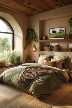 a bedroom with an arched window and green bedding