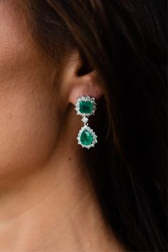 The MB Teardrop Earrings blend crystal stones in yellow tourmaline and emerald green, with a royal style and luxury look to create a unique statement piece. Intricately crafted with attention to detail, these earrings create an elegant and glamorous look. 925 Premium Sterling Silver, Green and Yellow gemstones, Zirconium crystals. Green Silver Earrings, Emerald Green Jewellery, Diamond Emerald Earrings, Royal Earrings, Emerald Green Jewelry, Emerald Earrings Drop, Emerald Diamond Earrings, Emerald Green Earrings, Yellow Gemstones