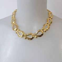 Beautiful vintage gold tone metal choker  Flexible snake-like construction Length: 45 cm / 17.7 '' Width: 2 cm / 0.78 '' Excellent condition Shipping will be charged only once when ordering multiple items from my shop More quality vintage items in my Etsy shop: https://www.etsy.com/shop/styled64 Vintage Metal Choker For Formal Occasions, Formal Vintage Metal Choker, Formal Metal Costume Jewelry Choker, Formal Metal Costume Choker, Retro Gold Metal Necklace, Retro Gold Choker Necklace, Gold Retro Choker, Vintage Gold Choker For Formal Occasions, Gold Formal Choker Chain Necklace