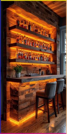 a wooden bar with lighted shelves and stools