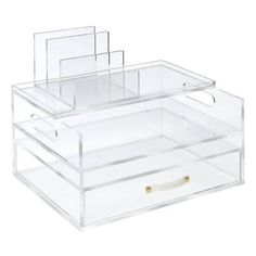 three clear acrylic drawers stacked on top of each other with gold tags in them