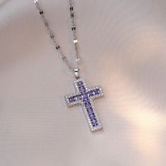 Description & Details Embrace the timeless symbol of faith, spirituality, and devotion with our exquisite pieces inspired by the sacred cross. Each design in our collection is meticulously crafted to honor the significance of the cross and serve as a beautiful reminder of one's beliefs and values. • Material: High Quality Titanium Steel ∙ Cubic Zirconia• Finish: Hypoallergenic ∙ Gold Plating• Dimensions: 40 - 45 cm chain, adjustable• All our work is custom made by hand with love Purple Cross Necklace, Purple Cross, Big Cross, Christian Quote, Timeless Symbol, Metal Cross, Purple Necklace, Couple Necklaces, Jewelry Lookbook