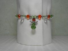 Green Red and Silver Angel Bracelet by Alisonsjewelryshop on Etsy, $9.98 Adjustable Green Jewelry For Holiday, Adjustable Green Jewelry For Holidays, Orange Beaded Bracelet With Lobster Clasp As Gift, Adjustable Nickel-free Red Charm Bracelet, Adjustable Charm Bracelet With Faceted Beads As Gift, Adjustable Orange Beaded Bracelet With Lobster Clasp, Adjustable Silver Beads Charm Bracelet Gift, Adjustable Red Beaded Dangle Bracelets, Angel Bracelet