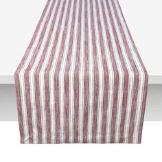 a red and white striped table runner