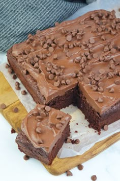 a chocolate cake with two slices cut out