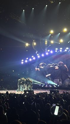 an elephant show is being performed on stage