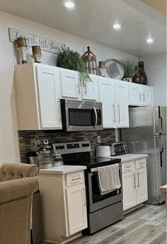 the kitchen is clean and ready for us to use in its new owner's home