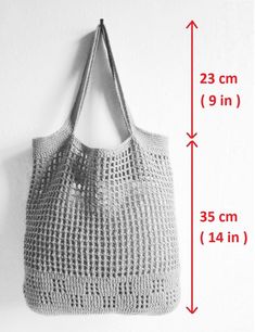 an image of a bag hanging on the wall with measurements for it to be measured