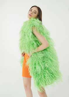 Made to order Please check my size chart before ordering if it's doesn't fit with my size chart please measure bust waist and hips -Coat length 36 Inches -Coat made with ostrich feathers -Color: more than 18 colors -Dry clean only Trendy Green Outerwear For Party, Party Fur Coat With Faux Fur Trim, Party Fur Coat With Feather Trim, Fluffy Fur Coat For Fall Party, Fitted Feathered Outerwear For Spring, Chic Fluffy Fur Coat For Party, Spring Party Outerwear With Feathers, Fitted Fluffy Fur Coat For Spring, Fluffy Fitted Fur Coat For Spring