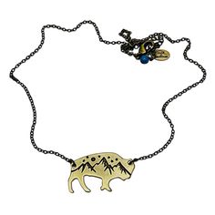 One of our favorite scenes of wildlife and nature, Mountains and bison, a wonderful combination to wear at any occasion. For this necklace, we have taken our very popular high alpine design and put it on the cutout of a bison. This necklace is available on a 18" simple cable chain or a 30" cord. Both are adjustable so can be worn shorter. You can request longer. Beads may vary on cord necklaces. This style is offered in two finishes: Matte Silver and Antique Brass. Click here to learn more about Cord Necklaces, Alpine Design, Mountain Jewelry, Nature Mountains, Nature Necklace, Cuff Rings, Leather Cuffs Bracelet, Leather Cuffs, Cord Necklace