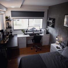 a bedroom with a bed, desk and window