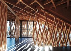 a room with wooden slats on the walls