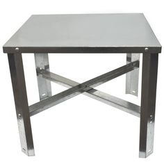 a square metal table with two legs