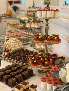 an assortment of desserts and pastries on display