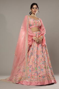 Candy floss pink raw silk lehenga with attached cancan, featuring hand embroidered floral puzzle patterns with cutdana and colorful sequins. Comes with embroidered padded blouse and dupatta.
Component: 3
Pattern: Hand Embroidered
Type Of Work: Floral Pattern, Sequins Cutdana
Neckline: Sweetheart
Sleeve Type: Puff Sleeve
Fabric: Raw Silk, Silk Organza
Color: Pink
Other Details: 
Floral patters
Embroidered cuffs
Back sheer panel
Approximate product weight: 4.5-5 Kg
Occasion: Bride, Wedding - Aza F Pink Raw Silk Saree With Dori Work, Pink Raw Silk Traditional Wear With Dori Work, Pink Raw Silk Traditional Wear With Resham Embroidery, Pink Raw Silk Dupatta, Pink Raw Silk Anarkali Traditional Wear, Pink Anarkali Traditional Wear In Raw Silk, Pink Traditional Wear With Resham Embroidery, Pink Dola Silk Sets With Gota Work, Pink Raw Silk Set With Zari Work