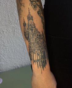 a person with a tattoo on their arm