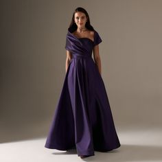 Elevate your style with our Off Shoulder Taffeta Maxi Dress. Its elegant design features a classic off-shoulder neckline and luxurious taffeta fabric for a classy and sophisticated look. Perfect for any occasion, this dress will have you feeling elegant and exclusive. Dark Purple Prom Dresses, Gown With Cape, Purple Evening Dress, Satin Evening Gown, Purple Maxi Dress, Taffeta Fabric, Floor Length Prom Dresses, Backless Prom Dresses, Maxi Dress Prom