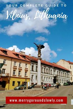 a statue in the middle of a street with text overlay that reads, your complete guide to vienna, lithuania