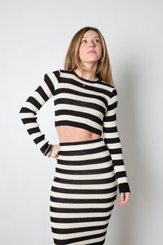 Make a statement with our Spare Top! This chic black and cream striped top is designed to fit perfectly, with long sleeves and a cropped fit. Wear on its own, or pair with our Spare skirt for a matching look that's sure to make heads turn! Materials: 89% Viscose and 11% Nylon All sale items are considered final sale. Striped Long Sleeve Crop Top For Fall, Chic Striped Cropped Crop Top, Chic Striped Cropped Top, Crop Top And Skirt, Packaging Tape, Adhesive Bra, Striped Crop Top, Black And Cream, Hat Hairstyles