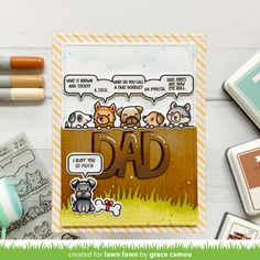 a father's day card with stamps, markers and other items on the table