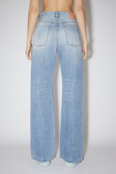 2021 jeans are cut to a loose fit with mid-waist, wide leg and long length. Made from rigid denim in light blue wash. Loose Fit Jeans, Jeans Bag, Cotton Style, Long Length, Fit Jeans, Jeans Fit, Bell Bottom Jeans, Acne Studios, Knitwear