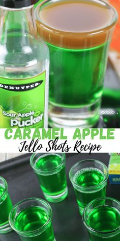 there are four shots in the shot glass and one is green with caramel on top