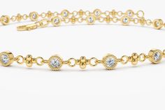 "14k Gold Diamond Bracelet / Art Deco Bezel Setting Diamond with Milgrain / Push Present / Birthday Gift for Her by Ferko's Fine Jewelry Features ✔Made to Order ✔Gold Kt: 14K (also available in 18K) ✔Available Gold Color: Rose Gold, Yellow Gold, White Gold ✔Round Diamond: 14 pcs 2.0MM ✔Total CTW: 0.45 ✔ Diamond Color-Clarity: G Color SI Clarity ✔Ready to Ship in 7-10 Business Days If you have any additional questions about this ring, just hit the \"Ask a Question\" button (just to the right of t Heirloom Diamond Bracelets For Anniversary, Elegant Yellow Gold Tennis Bracelet With Bezel Setting, Classic Bezel Set Bracelet For Anniversary, Classic Bezel Setting Anniversary Bracelet, Yellow Gold Jewelry Bangle With Bezel Setting, Classic Anniversary Bracelet With Bezel Setting, Exquisite Diamond Cut Bracelets As A Gift, Exquisite Yellow Gold Diamond Bracelet, Gold Bezel Set Tennis Bracelet For Wedding