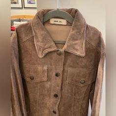 Nwt Jakketetc. Winnie Jacket In Taupe Brand New With Tag, Never Worn See Pictures For Condition-See Pic Of Collar Of Jacket- Little Bent So I Just Dropped The Price. Read Description In Pic 4. Color: Taupe (Sand / Tan Brown Color) Size: Extra Small Final Sale Classic Brown Cropped Long Sleeve Jacket, Classic Brown Long Sleeve Cropped Jacket, Classic Brown Cropped Jacket For Fall, Classic Long Sleeve Brown Cropped Jacket, Winter Leather Jacket With Snap Buttons, Beige Single-breasted Leather Jacket For Winter, Brown Utility Jacket For Fall, Brown Utility Jacket With Button Closure For Fall, Long Sleeve Leather Jacket With Flap Pockets For Fall