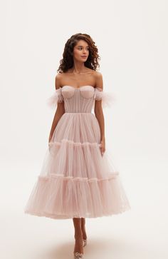 The tulle cocktail dress features a semi-transparent bustier with corset lacing, ruffle sleeves, and a partially lined skirt. Material: Tulle Composition: 100% polyester Skirt length from waist: 35.4 inches Dress weight: 3.52 lbs Neckline: Heart-shaped Back: Lace-up closure Built-in cups Lining: Light blue short underskirt Machine wash gentle cycle up to 86ºF Do not bleach Steam up to 250ºF Dry cleaning allowed Do not tumble dry Dry vertical Store hanging with inner straps on a notched hanger, p Bachelorette Theme, Tulle Cocktail Dress, Corset Lacing, Pink Tulle Dress, Winter Wedding Guest Dress, Tulle Party Dress, Tulle Midi Dress, Dress Weights, Pink October