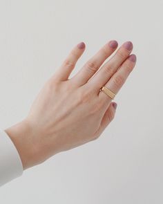 A rectangle, flat-top band for a graphic, but minimal, statement. 20mm x 6mm faceted face. Available in Solid Sterling Silver, 14k Gold Vermeil and Solid 14k. Modern Tarnish-resistant Wide Band Ring, Everyday Tarnish Resistant Wide Band Ring, Modern Thick Band Midi Rings For Anniversary, Modern Adjustable Engraved Ring, Modern Adjustable Engraved Metal Ring, Minimalist Wide Band Dome Ring For Everyday, Minimalist Everyday Dome Ring With Wide Band, Modern Stackable Rings With Thick Band For Gift, Modern Stackable Rings With Thick Band As Gift