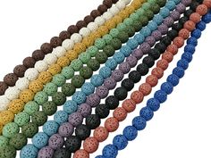 several colors of beads are arranged in rows