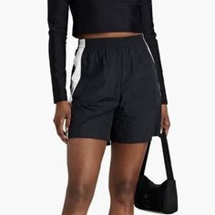 New With Tags Waist 28 Hip 40 Remiscent Of Your High School Warm-Up Attire, Penn Is An Elevated Take On An Athletic Short. Cut From Nylon With An Elastic Waistband And Striped Detailing. Nylon And Elastic Black Nylon Athleisure Shorts, Black Nylon Sportswear Bottoms, Black Nylon Short Leg Bottoms, Black Nylon Bottoms With Short Legs, Black Nylon Shorts With Short Legs, Black Nylon Bottoms With Elastic Waistband, Black Nylon Shorts For Summer, Black Shorts With Elastic Side Panels For Summer, Black Nylon Shorts For Spring